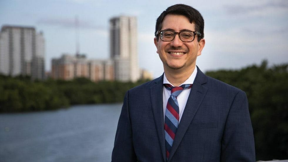 José Garza, the District Attorney in Travis County, Texas. Garza's office partnered with Public Rights Project to prosecute predatory businesses.